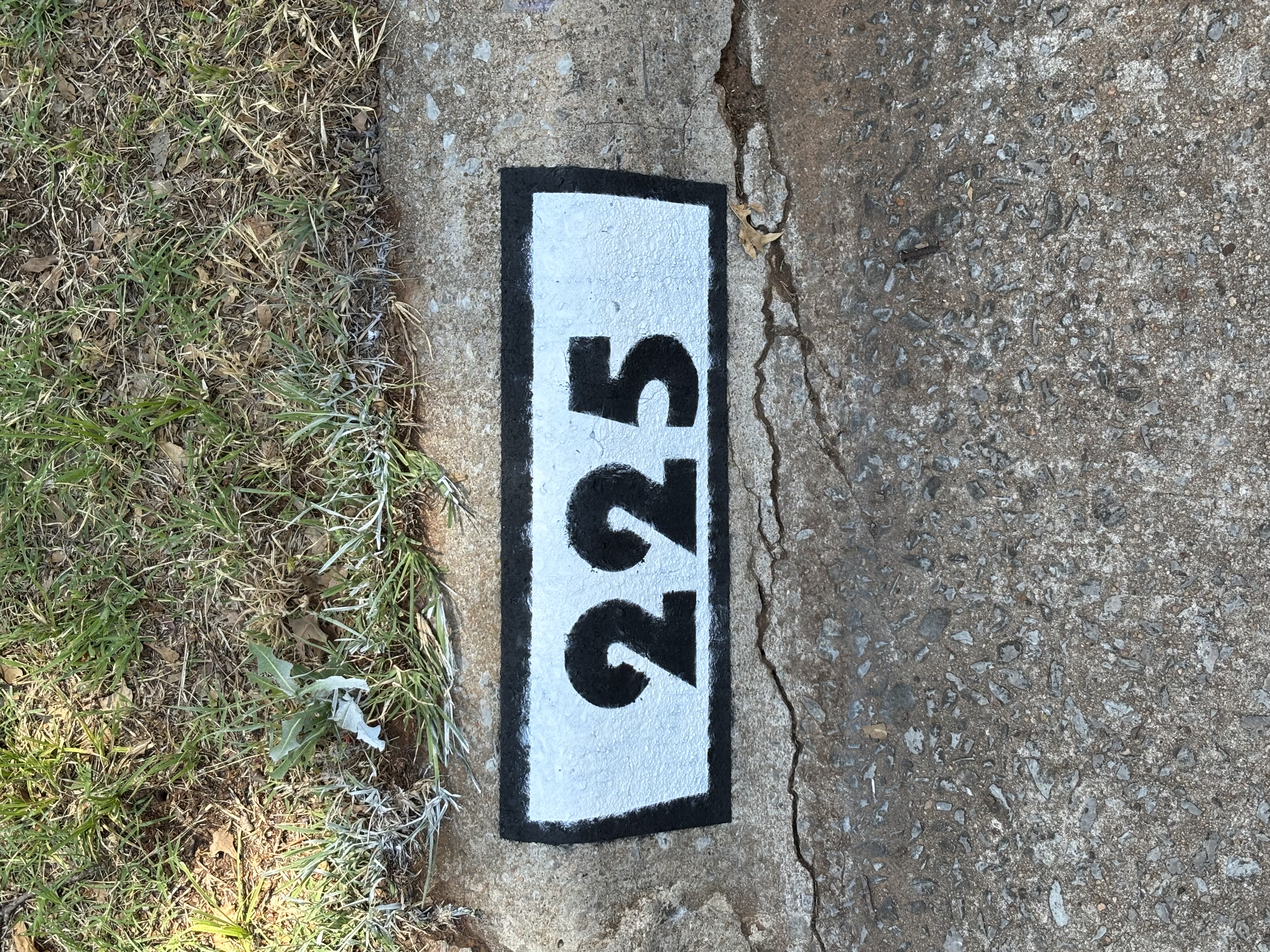 Fresh painted curb numbers